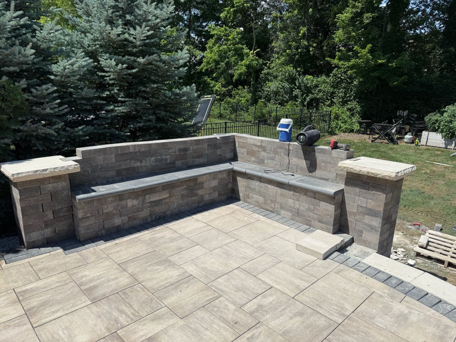 Stylish Paver Patio with Built-in Bench Completed image