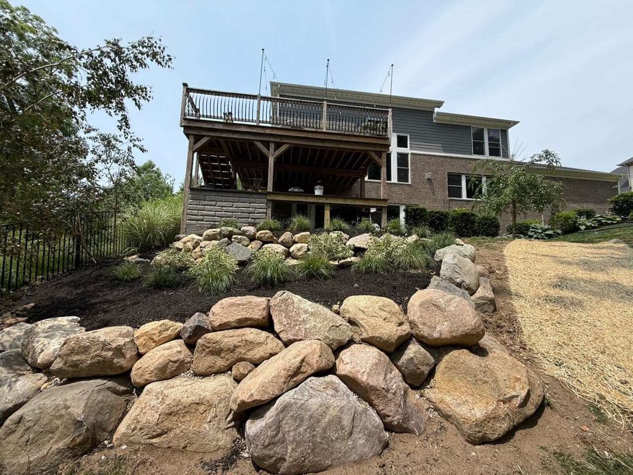 Stunning Backyard Transformation with Wooden Deck image