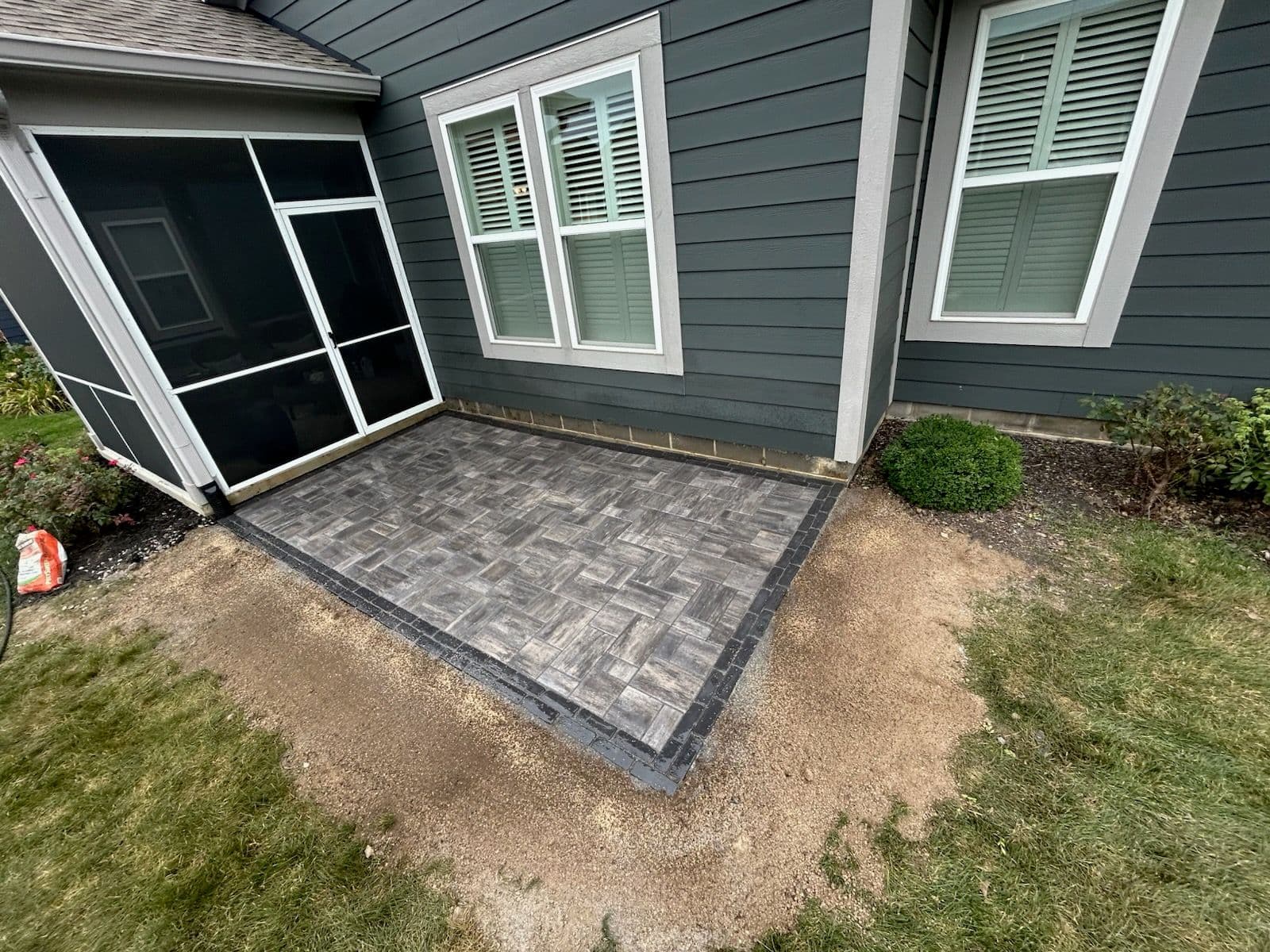 Stunning Geometric Tile Paver Patio Transformation image